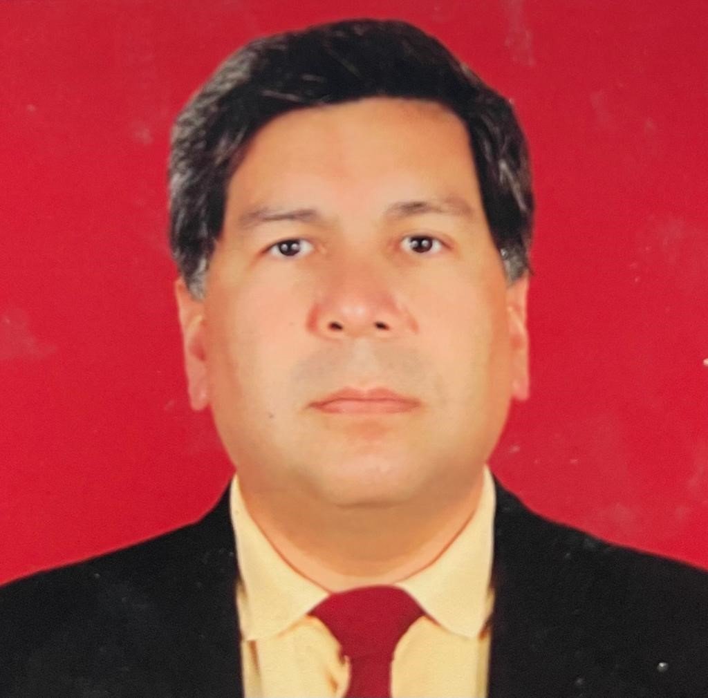 Dr. Holvis Dellien